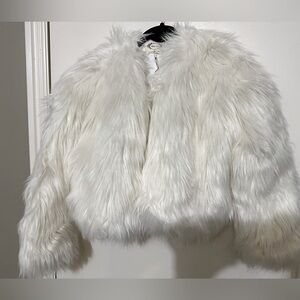 Brand new fur coat size 14
